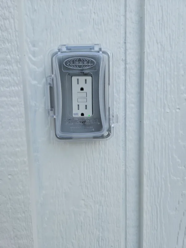 Hayes Electrical expertly installs a new weather-resistant GFCI receptacle, providing safe and reliable outdoor power for your home.